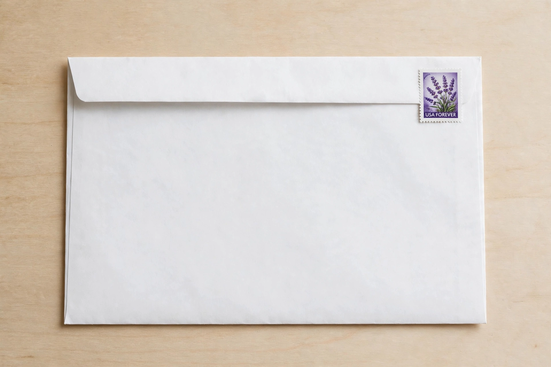Labeled envelope layout diagram showing the sender address in the top-left corner, the recipient address centered, and the stamp in the top-right corner